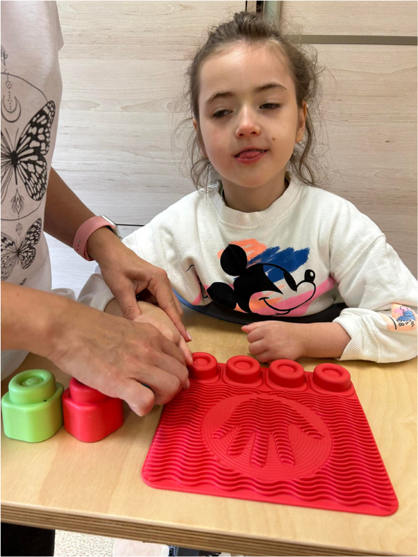 Spastyczność w KIF1A